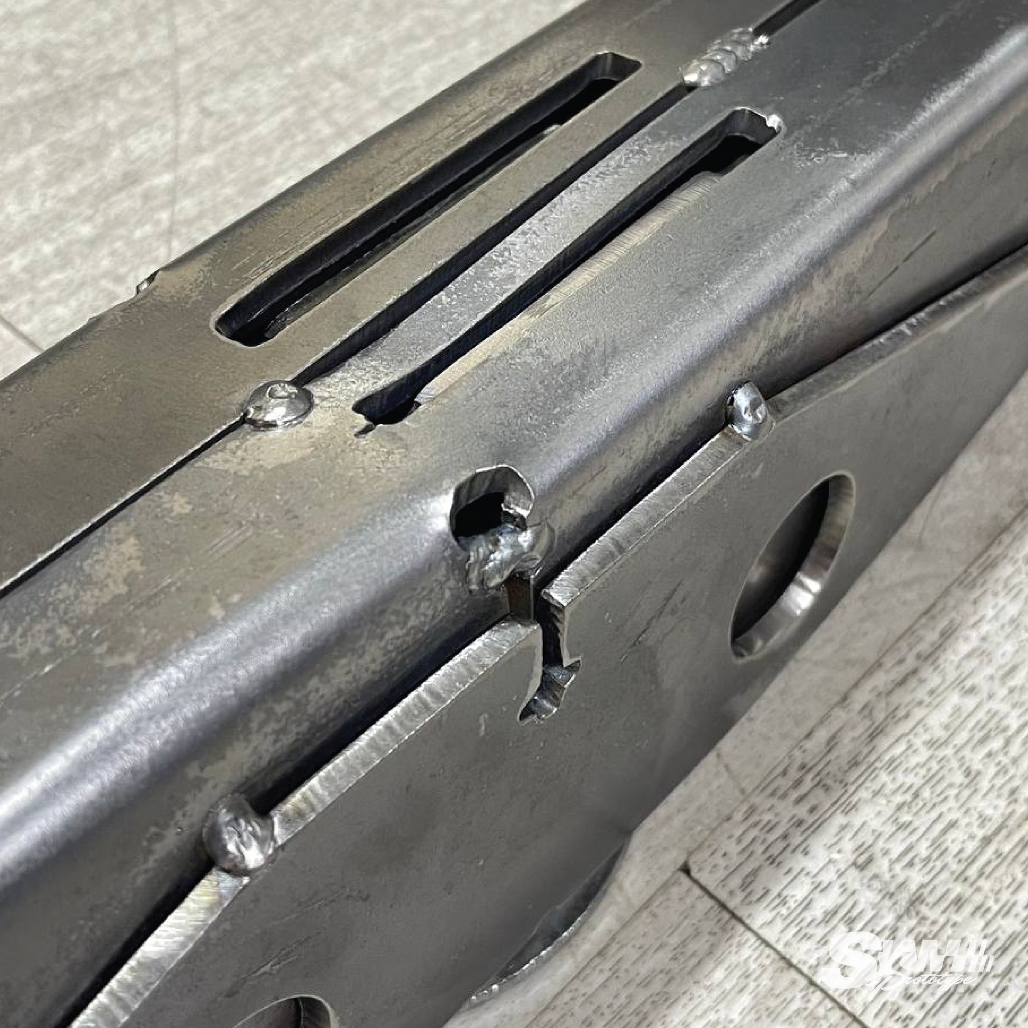 Lightening slots and weld detail