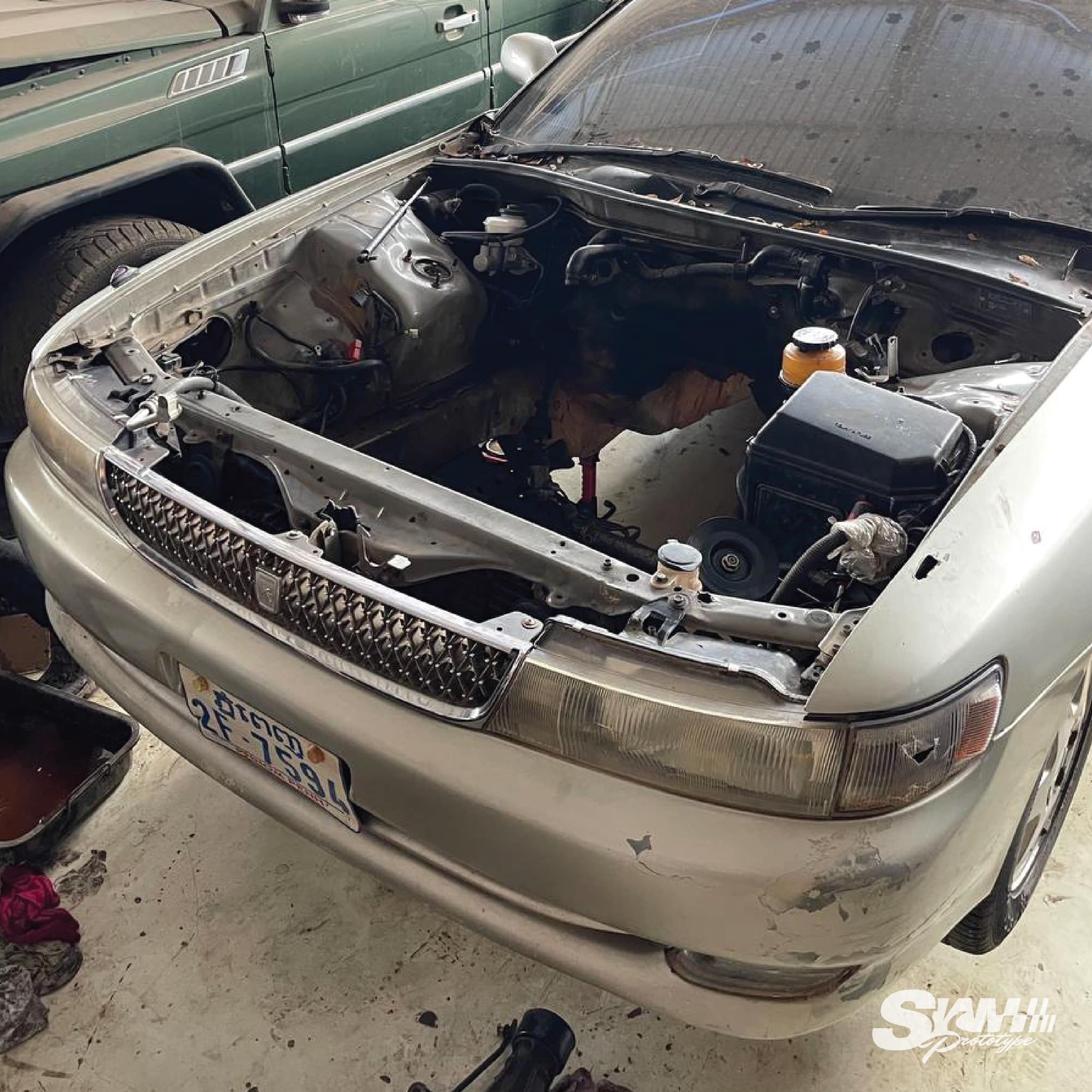 Stripped engine bay ready for 1JZ swap