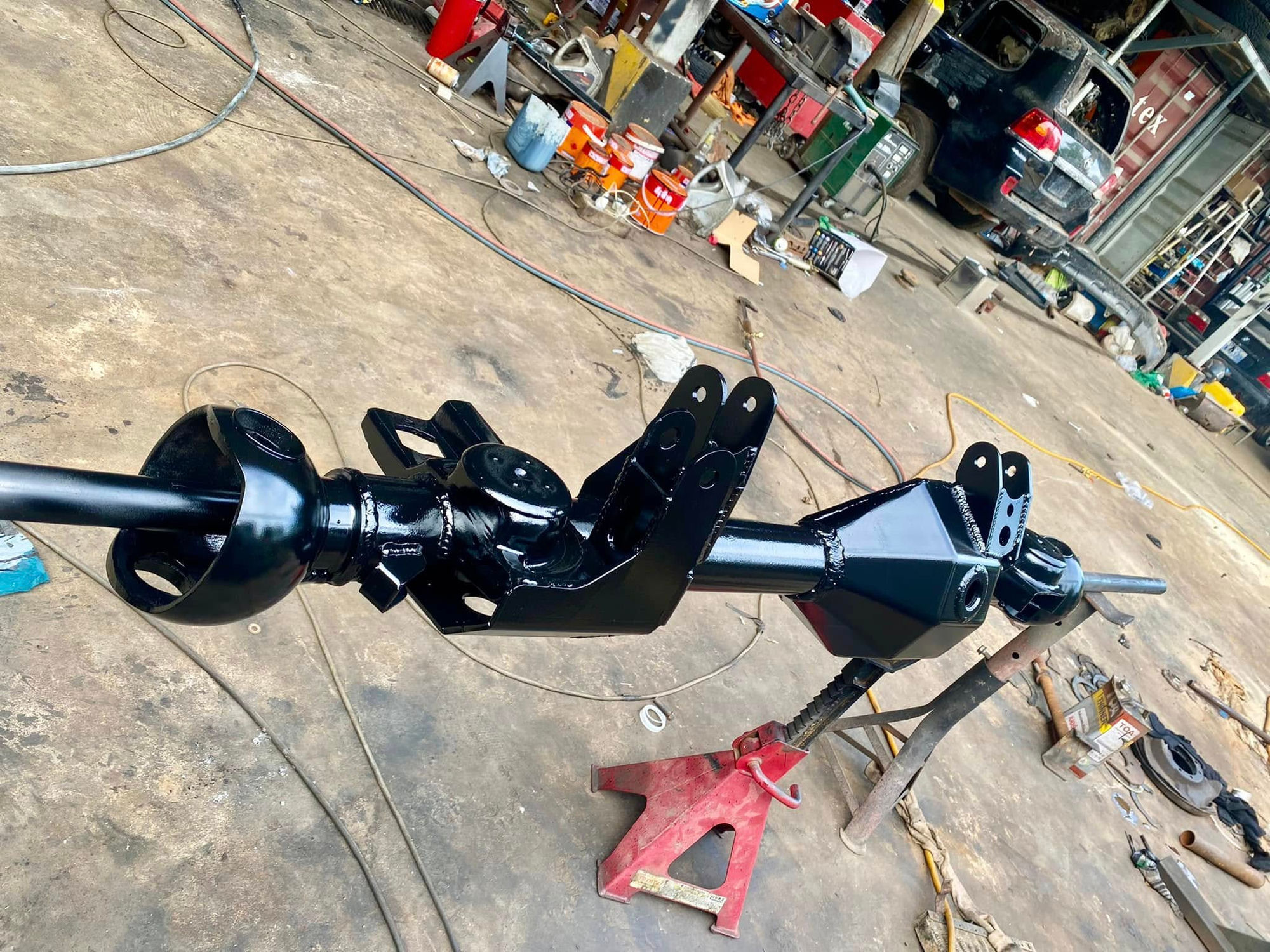 Front axle freshly painted black