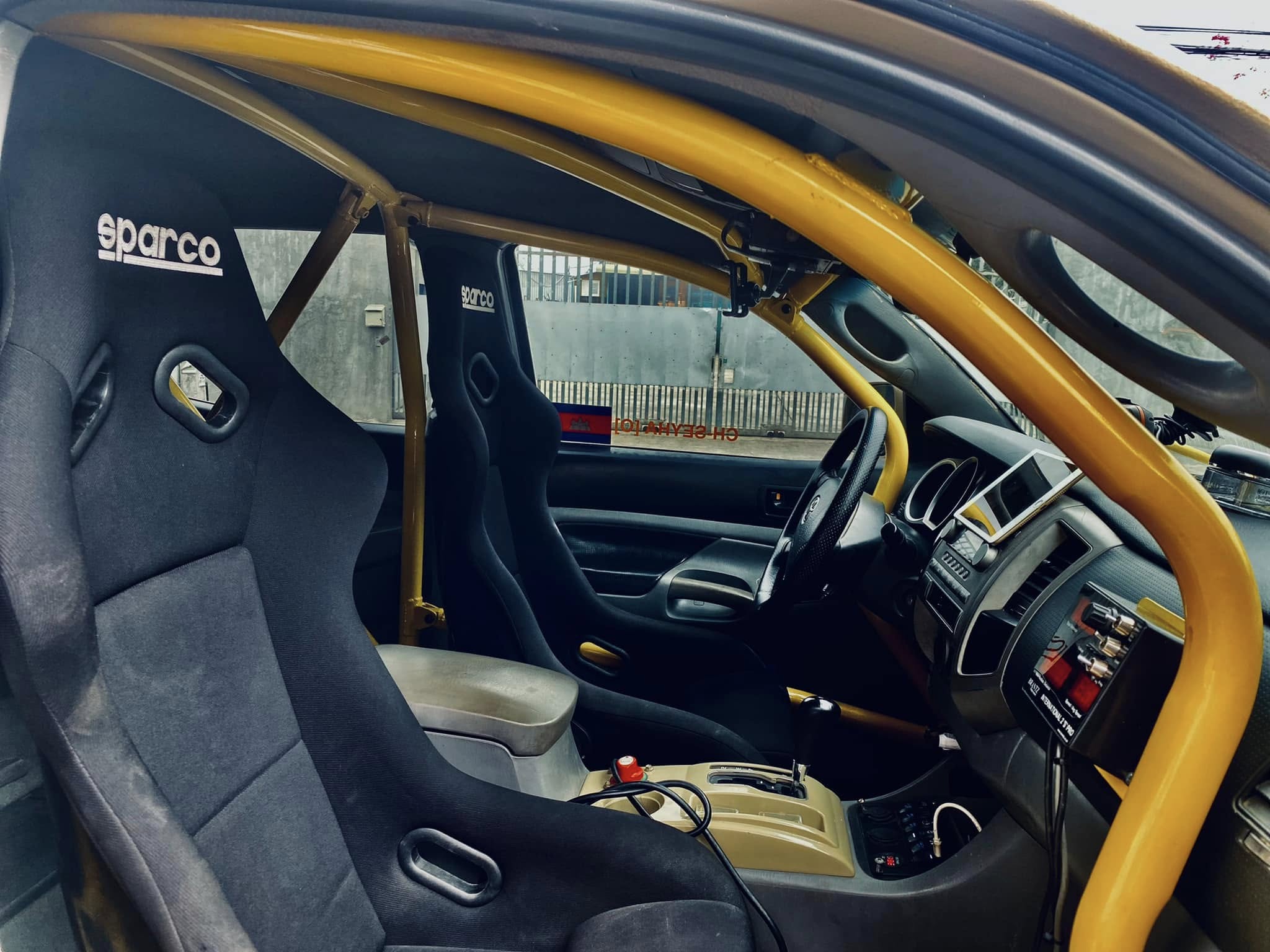 Sparco seats and yellow rollcage interior
